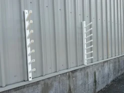Porte-barres à suspendre